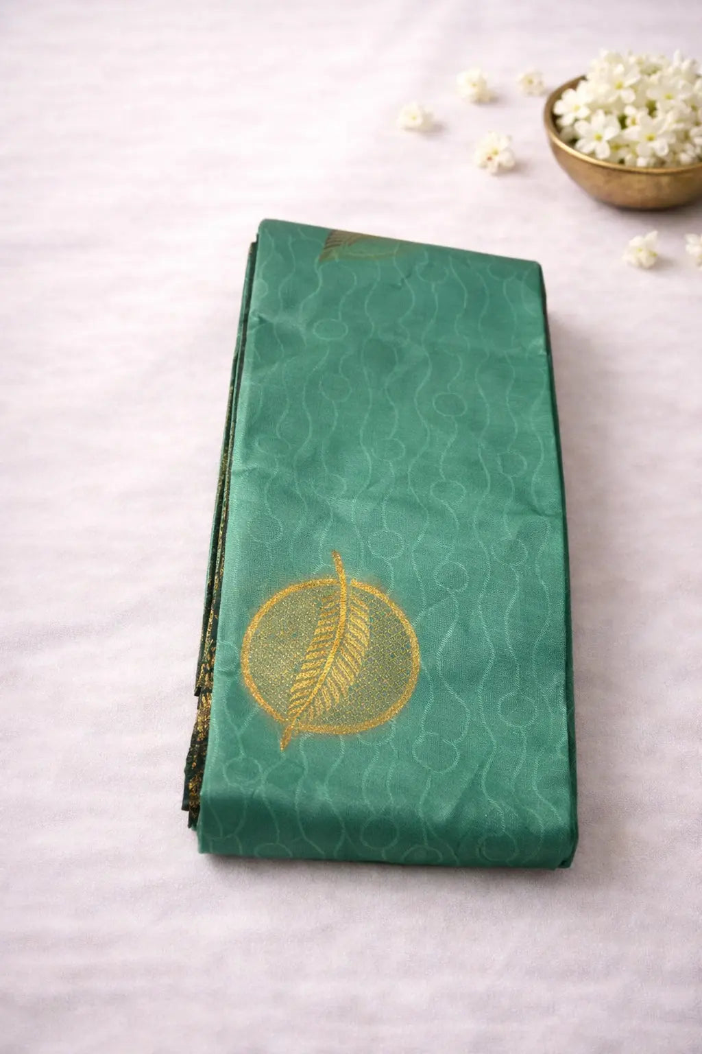 Elegant Teal Green Silk Saree with Gold Leaf Motif & Zari Border