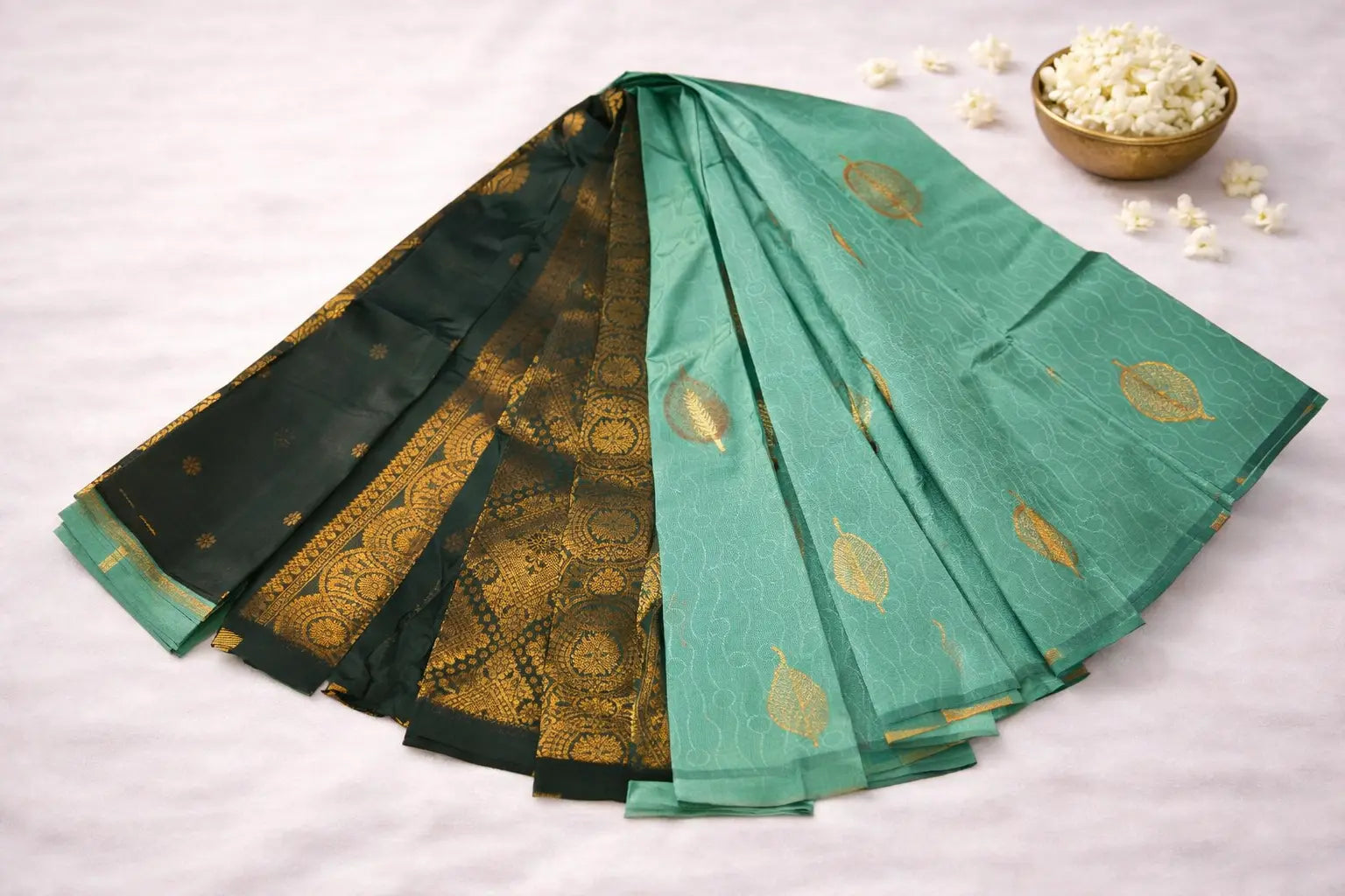 Elegant Teal Green Silk Saree with Gold Leaf Motif & Zari Border