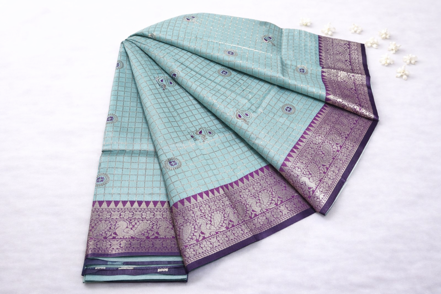 Elegant Sky Blue Silk Saree with Royal Purple Zari Border & Traditional Motifs