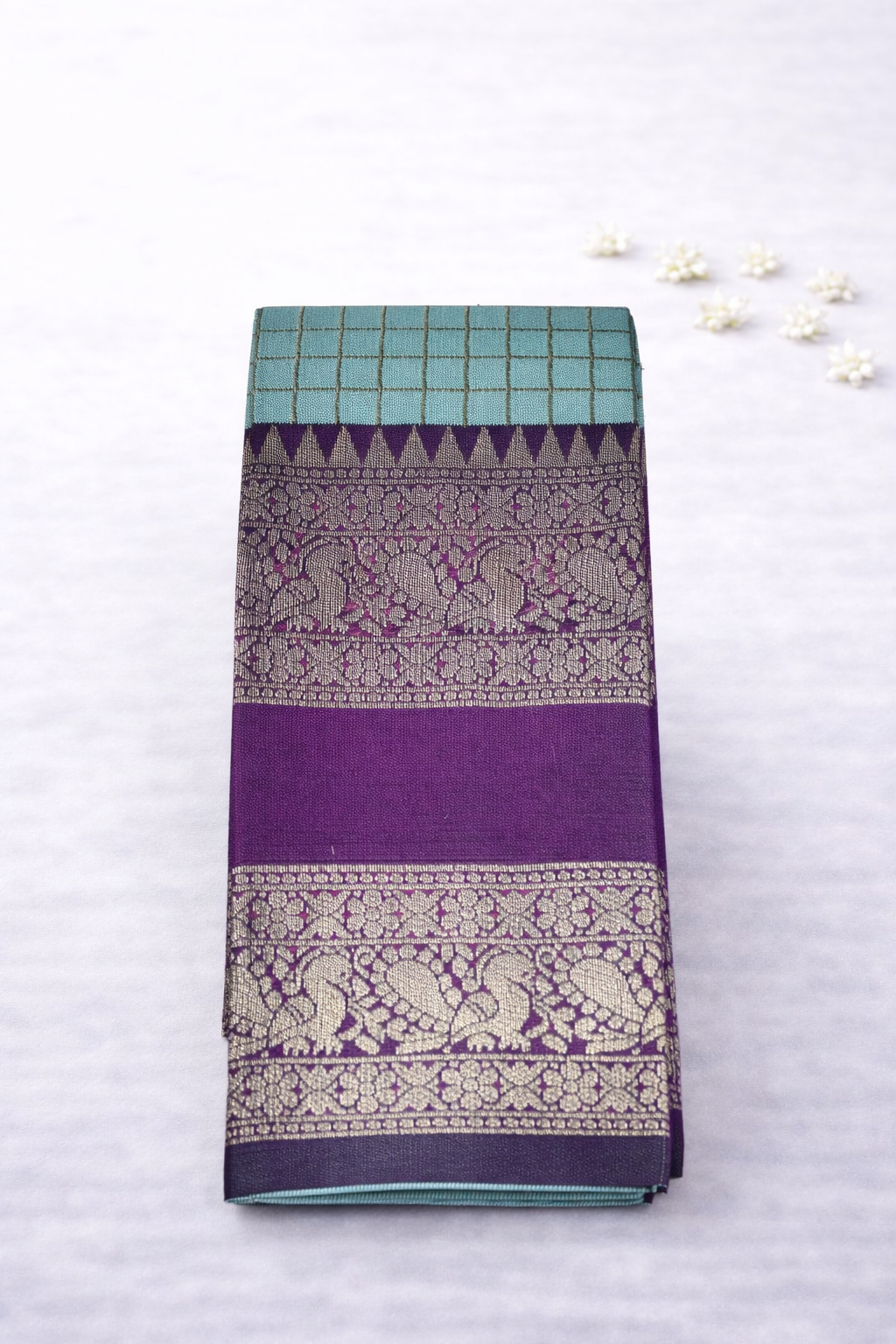 Elegant Sky Blue Silk Saree with Royal Purple Zari Border & Traditional Motifs