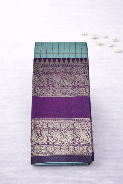 Elegant Sky Blue Silk Saree with Royal Purple Zari Border & Traditional Motifs
