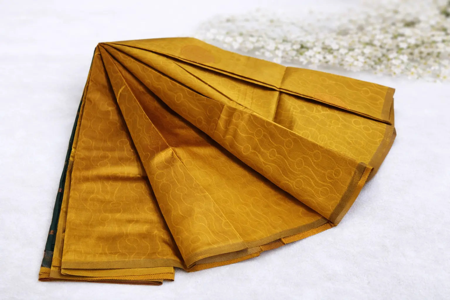 Mustard Gold Silk Saree with Contrast Green Border & Subtle Woven Motifs