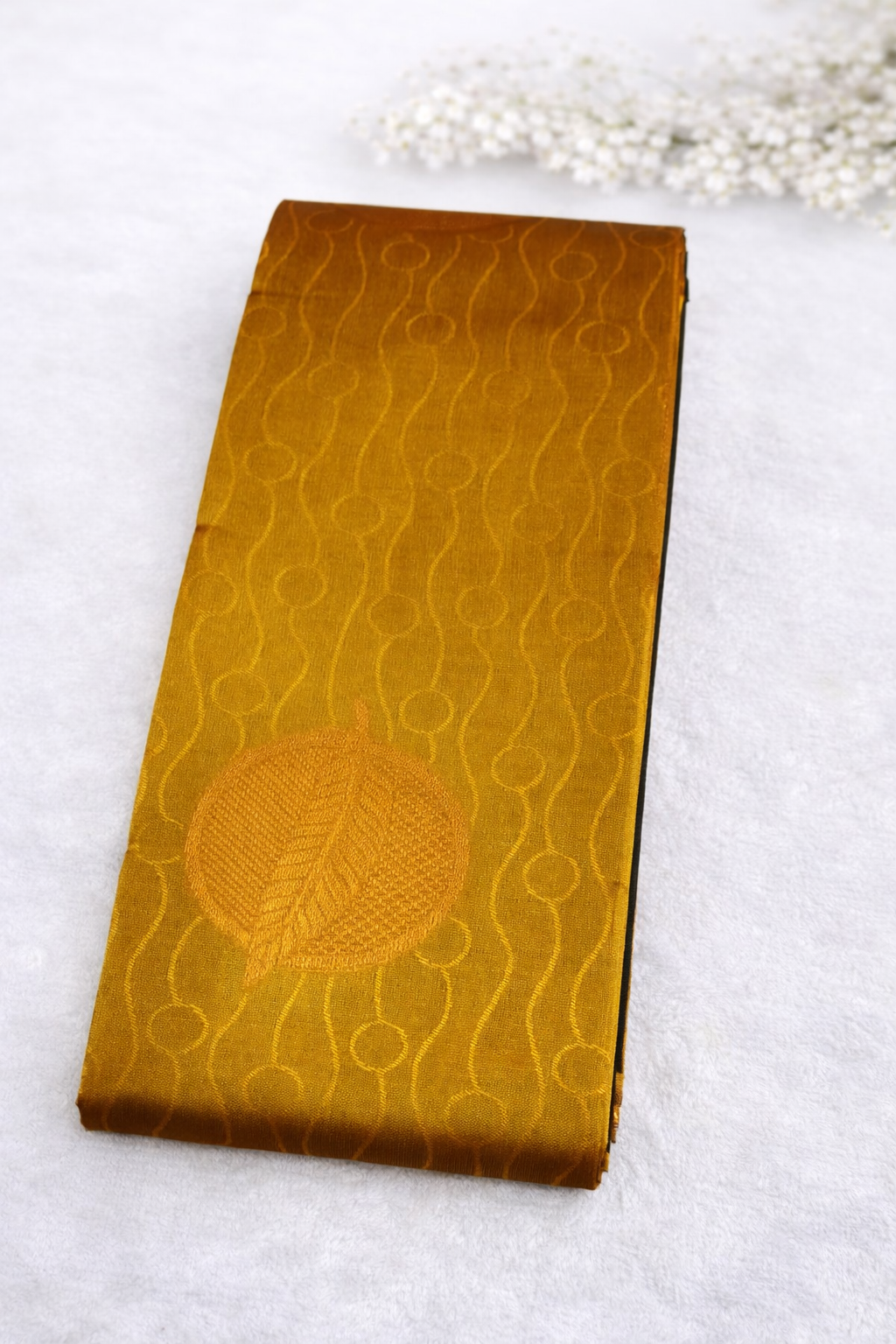 Mustard Gold Silk Saree with Contrast Green Border & Subtle Woven Motifs